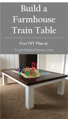 a coffee table with toys on it and the words build a farmhouse house train table