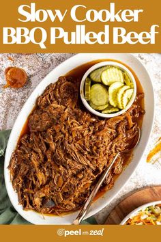 slow cooker bbq pulled beef with pickles on the side