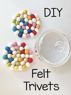 two felt trivets are sitting next to a cup with the words diy on it