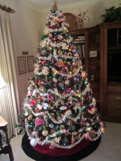 a decorated christmas tree in a living room