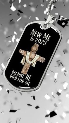 a dog tag that says new me in 2013 because he died for me