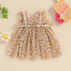 Dress your little one in the perfect combination of cuteness and elegance with our AUTUMN SUN Floral Tulle Dress. Perfect for summer, this dress features cute bows and beautiful floral tulle design that is sure to make your baby girl stand out. She will stay stylish and comfortable with this must-have dress! Baby Summer Clothes, Tulle Outfit, Tulle Skirts Outfit, Floral Tulle Dress, Baby Girl Princess Dresses, Flower Romper, Autumn Sun