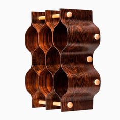 Style: Mid-Century
Design Period: 1950 to 1959
Country of Manufacture: Sweden
Materials: Beech, Rosewood
Color: brown
Dimensions: Width: 23, Depth: 11, Height: 27.5 Rosewood Color, Vintage Wine Rack, Vintage Wine, The 1950s, Mid Century Design, Wine Rack, Sweden, Period, Mid Century