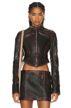 Find Mimchik Moto Leather Jacket In Brown on Editorialist. Mimchik Moto Leather Jacket in Brown Self: 100% leather Lining: 100% nylon. Made in USA. Dry clean only. Front zipper closure. Zipper pockets at chest. Zipper cuffs. Item not sold as a set. MMCF-WO2. moto leather. About the designer: Fitted Leather Jacket With Padded Collar, Fitted Leather Moto Outerwear, Moto Style Fitted Biker Jacket With Padded Collar, Fitted Moto Biker Jacket With Padded Collar, Fitted Moto Outerwear With Padded Collar, Fitted Moto Leather Jacket With Zipper Closure, Designer Leather Jacket With Zipper Closure, Fitted Biker Leather Jacket With Zip Fly, Fitted Leather Jacket With Zipper