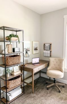 a room with a desk, chair and bookshelf