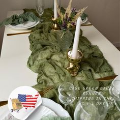 the table is set with plates, candles and napkins for an american day celebration