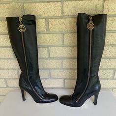 Vintage Juicy Couture Tall Black Leather Boots With Full Side Zipper And Logo Charm Smells Like Couture Gold Bottoms Made In Italy Size: 9 Condition: Excellent!! These Have Never Been Worn. These Boots Are Made Of The Softest Leather Ever, They're Absolutely Gorgeous. Zippers Work Perfectly. Little Bit Of Tarnishing To Hardware (Charm Logo And Zipper), Please See All Photos. Gold Hardware Juicy Couture Logo Zipper Pull Juicy Crown Logo On Front Iconic Smells Like Couture Gold Bottoms Approx Meas Leather Party Boots With Side Zipper, Leather Boots With Side Zipper For Party, Elegant Black Boots With Zipper Closure, Luxury Leather Boots With Zipper Closure, Black Calf Leather Boots With Zipper Closure, Juicy Coutore Boots, Black Over-the-knee Boots With Zipper Closure, Fitted Leather Knee-high Boots With Zipper Closure, High Heel Knee-high Boots With Zipper Closure