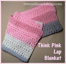 two pink and gray crocheted blankets sitting next to each other