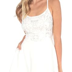 Beautiful, Speechless Dress With Rounded Neckline Spaghetti Straps Fitted Bodice With Silver Floral Accents Crisscross Open Back. Size 9. Spaghetti Strap Mini Dress With Lined Bodice For Wedding, Wedding Mini Dress With Lace Bodice And Spaghetti Straps, White Lace Backless Mini Dress, White Dresses With Lace Bodice And Spaghetti Straps, White Sleeveless Dress For Homecoming, White Sleeveless Homecoming Dress, White Mini Dress With Spaghetti Straps And Fitted Bodice, Wedding Mini Dress With Spaghetti Straps And Lace Trim, Wedding Mini Dress With Lace Trim And Spaghetti Straps