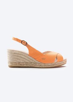 These stylish and flirty Llansa canvas wedges have a flattering slingback heel, an elegant buckle and soft cotton, 100% organic canvas for a comfortable, luxurious fit. And with a gorgeous 2 ½” heel, they’re comfortable enough to get you from sunny days to stylish nights. TOP TIP: STYLING Sexy and stylish, these handmade espadrille wedges feature eco-friendly jute soles for natural breathability, the perfect party shoes for those hot summer evenings. TOP TIP: SIZING If you are an in-betweener tr Beach Wedges, Sell Shoes, Comfortable Wedges, Slingback Heel, 4 Inch Heels, Womens Wedges, Grey And Beige, Wedge Espadrille, Stylish Shoes