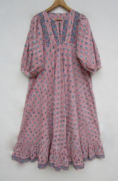 ITEM DESCRIPTION summer pink booty printed cotton long maxi dress - Henley neckline with button dress - 3/4th sleeve with button maxi Features: 3/4th sleeve, Henley neck, Long dress Fabric: 100% Cotton cambric hand block printed fabrics  Sleeve Length = 18 inch For more sizes & their measurement, please refer our below chart to understand the sizes variations available with us For your size requirement, please mention your size in seller note at the time of buying. SIZE MEASUREMENT  BUSTLENGTHSHOULDER XXS34 inch51 inch13.5 inch XS36 inch51 inch14 inch S38 inch51 inch14.5 inch M40 inch51 inch15 inch L42 inch51 inch16 inch XL44 inch51 inch16.5 inch 2XL46 inch51 inch17 inch 3XL48 inch51 inch18 inch   Company Return Policy:  Please write for more information to my email directly CHOOSE "ASK SE Pink Half-sleeve Maxi Dress For Spring, Pink Half Sleeve Maxi Dress For Spring, Pink Cotton Midi Dress For Daywear, Pink Printed Floor-length Maxi Dress, Pink Cotton Midi Dress, Bohemian Pink 3/4 Sleeve Dress, Bohemian Pink Dress With 3/4 Sleeves, Pink Floor-length Maxi Dress For Daywear, Pink Half-sleeve Beach Dress