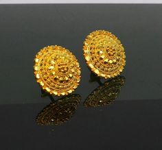 22kt yellow gold stud earrings, the purity of gold is 91.6% , 22kt hallmarked stud earring for best gifting to girls, amazing wedding anniversary tribal filigree work jewelry.Metal-22kt yellow gold.Item type-Stud earrings.Weight-4.890 grams approx.Size-1.7 mm approx.Stamped-916/22kt hallmarked Makes excellent gifting for birthday, valentines day, christmas day, mother's day, wedding, anniversary, engagement party. 22k Yellow Gold Bridal Earrings, 22k Yellow Gold Round Bridal Earrings, 22k Gold Hallmarked Bridal Earrings, 22k Gold Filigree Earrings, Studs Earrings Gold India, Small Earrings Gold, Yellow Gold Stud Earrings, Diamond Bracelet Design, Fancy Jewelry Necklace