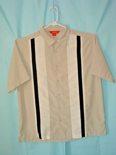 Charlie Harper style men's casual shirt from SOLERO in size XL. 100% polyester, short sleeve, button front. Sewn contrasting panels on the front. Great condition. Spare button still sewn to the materials tag. Measures 24" pit to pit and 30" collar to hem. Free next day shipping!