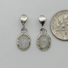 These is a beautiful pair of Sterling Silver Earrings with a Rainbow Moonstone Gemstone. The earrings are made out of solid 925 Silver and there is no nickel or other substances causing most allergies. This makes the earrings hypo allergenic. Size of one Earring in total 2.1 x 0.8 cm or 0.83 x 0.31 inch You will receive the item in a gift box - perfect to surprise someone or yourself. Usually we ship on the same day we receive the payment for the order. We want you to be happy with your purchase To Be Happy, Rainbow Moonstone, Allergies, Sterling Silver Earrings, Moonstone, Silver Earrings, 925 Silver, Dangle Drop Earrings, Gift Box