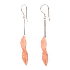 Descending from bars of sterling silver four leaves are handcrafted from copper bathed in 18k rose gold. Bali's Nyoman Nartawan designs this feminine pair of dangle earrings. Elegant Copper Leaf Jewelry, Rose Gold Sterling Silver Linear Pierced Earrings, Super Bubbles, Pink Baths, Rose Bath, Rose Gold Accents, Wallpaper Accent Wall, Sterling Silver Dangle Earrings, Silver Earrings Dangle