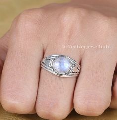 Rainbow Moonstone Ring, 925 Sterling Silver Ring, June Birthstone Round Gemstone Ring, Women Silver Ring, Handmade Ring, Bridesmaid Gifts Gemstone Name - Rainbow Moonstone  Stone Quality - AAA Ring Weight - 2.88 gm Stone Shape - As shown in the picture You'll get the exact product as shown in the pictures We serve complete 925 sterling silver Jewelry and genuine properties of the stone. The products are dispatched from the small business from USA. Product Quality and Packaging - Our all products are 925 Silver Stamped which shows that the product is genuine and authentic .The products are dispatched from the small business from USA so you get the product on time and the product packaging comes in bubble foil wrap with all the precautions taken primarily that your product reaches you with z Silver Birthstone Ring With Natural Stones For Anniversary, Silver Birthstone Ring With Natural Stones For Promise, Sterling Silver Moonstone Ring With Natural Stones, Round Moonstone Crystal Ring With Gemstone, Silver Crystal Gemstone Ring, Silver Moonstone Birthstone Ring With Round Band, Silver Moonstone Ring With Round Gemstone, Fine Jewelry Moonstone Ring With Natural Stones, Silver Moonstone Ring With Birthstone