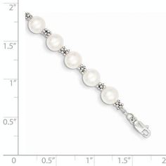 14KT White Gold White Round Freshwater Cultured Pearl Bracelet. The Bracelet Features White Freshwater Cultured Pearls that are 6-7 millimeters in Width that are Set throughout the Milgrain White Gold Beaded Design. The Bracelet is 7.25 Inches in Length.