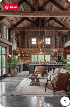 a living room filled with furniture and lots of wooden paneled walls in front of an open floor plan