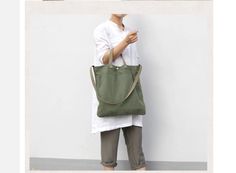 Simple Art Shoulder Bags Women on Luulla Large Everyday Canvas Shoulder Bag, Khaki Rectangular Canvas Bag With Adjustable Strap, Large Canvas Shoulder Bag For Everyday Use, Handmade Green Canvas Shoulder Bag, Casual Square Shoulder Bag For Gift, Modern Green Rectangular Canvas Bag, Rectangular Khaki Canvas Bag For Daily Use, Khaki Rectangular Canvas Bag For Daily Use, Modern Green Canvas Shoulder Bag