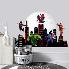 the avengers wall decals are on display in this children's room, with superheros and spider - man