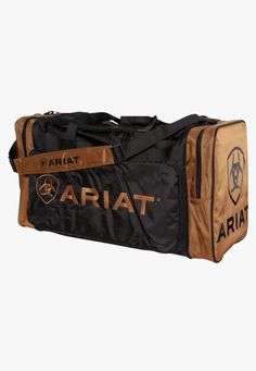 Take on any adventure with the Ariat Gear Bag. Featuring multiple compartments, a detachable shoulder strap and heavy duty fabric to maximise durability and protection. Large gear bag  Heavy duty poly fabric Detachable shoulder strap  Heavy duty zippered end pockets Top zip opening to the main compartment  H14" x W28" Ariat Logo, Western Spurs Straps, Saddle Pads English, Western Saddle Pads, Saddle Accessories, Travel Boots, Gear Organizer, Saddle Cover, Mini Horse