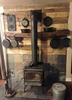 an old fashioned stove in a rustic kitchen