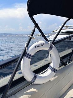 a life preserver hanging from the side of a boat