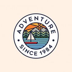 the adventure since logo with mountains and trees in the background, as well as a sailboat