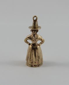 "This is a vintage \"Pilgrim\" 9 karat gold charm for a charm bracelet.  It weighs 4.95 grams and measures 1/2\" x 1 1/4\", marked \"9, 375\" All charms come with a split ring to attach to a bracelet. We have hundreds of charms in stock. If you don't see what you are looking for in our shop please contact us as it is likely we have it. Inventory #G3035" Antique Brass Charms For Collectors, Vintage 14k Gold Charms, Split Ring, Gold Charm, Vintage Charms, Split, Charm Bracelet, Charms, Bracelet