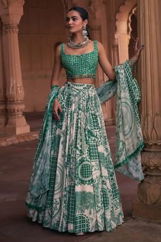 Dark green lehenga with a separate cancan, sequins embroidered waistband and thikri, grid and floral print. Comes with a mirror work padded blouse and a dupatta. - Aza Fashions Dark Green Lehenga, Cape Lehenga, Print Lehenga, Kurta Lehenga, Lehenga Pattern, Green Lehenga, Lehenga Skirt, Luxury Sale, Floral Squares