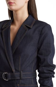 Make a stunning statement in this belted blazer-inspired dress made from dark-wash denim and popped with cargo pockets and ruched three-quarter sleeves. 35" length (size 8) Notched lapels Three-quarter sleeves Cargo flap-patch pockets Attached belt 77% cotton, 21% polyester, 2% elastane Partially lined Dry clean Imported Denim Coat Women, Blue Trench Coat, Trench Dress, Belted Blazer, Single Breasted Coat, Denim Blazer, Belted Coat, Denim Mini Dress, Inspired Dress