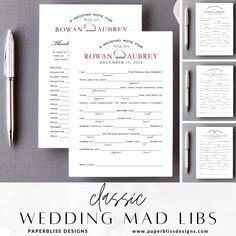 the wedding stationery is set up on top of a table with pen and paper