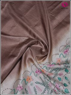 Gachi Tussar Silk is a lot more textured than any other variety of silk. Tussar silk saree in brown boasts a rich, earthy tone with a subtle sheen that adds elegance to the fabric. This saree is accentuated with handbrush painted on half white pallu exhibits a unique blend of rustic allure and artistic expertise. The intricate hand brush painting of florals, butterflies and birds in vibrant shades enhances the natural elegance of the Tussar Silk. This saree has a half white blouse unstitched blo Brown Art Silk Dupatta For Wedding, Traditional Brown Silk Scarf, Brown Raw Silk Dupatta With Zari Work, Brown Silk Dupatta With Zari Work, Brown Silk Dupatta For Wedding, Brown Zari Work Dupatta, Brown Chanderi Dupatta With Cutdana, Brown Cutdana Embellished Unstitched Dupatta, Festive Brown Unstitched Dupatta