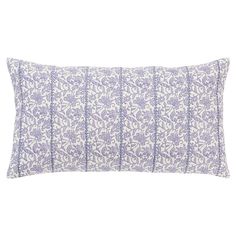 a purple and white pillow on a white background