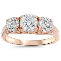 three stone diamond ring in rose gold