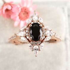 Classic Black Diamond Ring For Wedding, Black Heirloom Ring With Center Stone, Heirloom Black Ring With Center Stone, Classic Black Diamond Promise Ring, Black Oval Cluster Ring For Anniversary, Elegant Black Cluster Ring For Promise, Black Oval Diamond Wedding Ring, Black Cluster Ring For Wedding, Fine Jewelry, Elegant Black Marquise Cut Diamond Ring