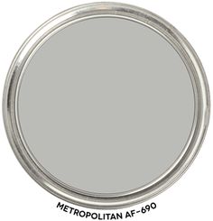 the gray owl oc - 52 paint is shown in this round, metal tin