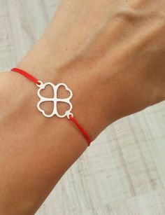 Lucky Four Leaf Clover Bracelet Silver Clover Red String Bracelet Good Luck Bracelet Red Silk String Bracelet Lucky Four Leaf Gift Minimalist String Bracelet Clover Jewelry - perfect as a gift for a best friend or for that beach/surfer look - adjustable bracelet - waterproof - Sterling Silver clover (21mm) Primary color for string is red. If you want another color, please select from Secondary color. Visit our shop here: https://www.etsy.com/your/shops/ParticleJewelry Elegant Red Bracelet For Gift, Red Heart-shaped Bracelets As A Gift, Red Heart-shaped Bracelets For Gift, Dainty Red Adjustable Bracelet, Dainty Adjustable Red Bracelet, Red Bracelet Jewelry Gift, Red Bracelet Jewelry For Gifts, Elegant Red Friendship Bracelets, Elegant Red Bracelets For Friendship