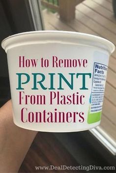 a person holding up a cup with the words how to remove print from plastic containers