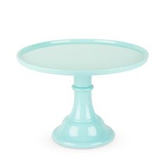 a blue cake plate on a white background