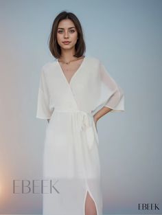 Ebeek - Premium Surplice Neck Maxi Dress with Ruched Half Sleeves - Sophisticated Womens Fashion Attire Elegant Wrap Dress With Surplice Neckline For Brunch, Elegant Draped Midi Dress For Daywear, Elegant Draped Midi Dress For Brunch, Elegant Draped Daywear Dresses, Elegant Summer Chiffon Wrap Dress, Elegant Wrap Dress For Brunch, Elegant Wrap Midi Dress For Brunch, Chic Chiffon Wrap Dress, Chic Chiffon Wrap Dress For Spring