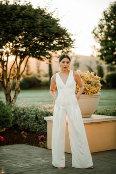 bridal jumpsuit Wedding Dress Alternative Pants, Women’s Pant Suit Wedding, Lesbian Wedding Outfits Jumpsuit, Simple Wedding Jumpsuit, Wedding Reception Pantsuit For Bride, Reception Pantsuit For Bride, Non Traditional Wedding Outfit The Bride, White Wedding Jumpsuit Brides, Lesbian Wedding Jumpsuit