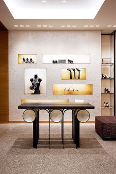 an empty room with high heel shoes on display