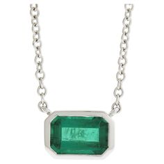 --Stone(s):-- (1) Natural Genuine Emerald - Emerald Cut - Bezel Set - Clean Vivid Green Color - Very Nice Quality - 6x4mm - 0.60ct (approx.) Total Carat Weight: 0.60 (approx.) Material: Solid 18K White Gold Weight: 2.78 Grams Chain Type: Cable Link Chain Length: 18 Inches (measured next to a ruler with pendant) Clasp: Lobster Claw Pendant Width: 7.2mm (0.28") Pendant Height: 5mm (0.19") Pendant Thickness: 3.1mm Stamp: Kwiat - 129296 - 18K Condition: Comes w/ original inner & outer box. Excellent Classic Bezel Set Emerald Pendant Necklace, Classic Emerald Pendant Necklace In Bezel Setting, Classic Emerald Pendant Necklace With Bezel Setting, Classic Emerald Necklaces With Bezel Setting, Classic Emerald Necklace With Bezel Setting, Classic Sterling Silver Emerald Necklace With Prong Setting, Fine Jewelry Emerald Necklace With Bezel Setting For Anniversary, Platinum Solitaire Necklace With Bezel Setting, Solitaire Pendant Necklace