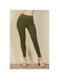 Introducing our Solid High Waist Leggings, the epitome of comfort and style for your active lifestyle. Crafted from a premium blend of 90% Polyester and 10% Spandex, these leggings offer a luxurious feel with medium weight stretch novelty premium knit fabric.Key Features:Fabric: Our leggings are made from a soft, sleek, and medium-weight stretch novelty premium knit fabric, providing a comfortable and supportive fit that moves with you.Fit: Designed with a high waist for added support and covera Solid Leggings, High Waist Leggings, Yoga Session, Active Lifestyle, High Waisted Leggings, Medium Weight, Running Errands, Effortless Style, Women's Leggings