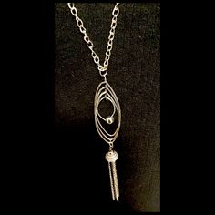 30” Adjustable Size, Silver Hoops And Chain Fringes Pendant Necklace! Has A Silver Lobster Claw Clasp. Makes An Excellent Gift For Yourself Or Your Loved Ones! Comes Already Gift Wrapped And In A Fancy Gold Gift Box! Comes From A Smoke And Pet Free Environment. Please Ask Any Questions You Have. Offers Welcome! Bundle Items From My Closet And Save! Thank You For Shopping With Us At Nancy’s Creative Treasures! New To Poshmark? Use Code Enderockz To Sign-Up And Save $10 On Your First Purchase! Trendy Silver Metal Lariat Necklace, Silver Lariat Necklace In Stainless Steel, Silver Stainless Steel Lariat Necklace, Silver Chain Metal Lariat Necklace, Long Silver Chain Necklace, Elegant Long Dangle Necklace In Metal, Nickel Free Metal Lariat Necklace, Metal Dangle Long Necklace For Gift, Metal Long Dangle Necklace As A Gift