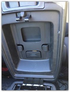 the inside of a car with its door open