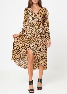 Feel the power of our Brown Leopard Print Puffy Shoulder Dress! With its voluminous shoulder detailing, waist cinching wrap design, and comfortable lining, you'll never want to take it off. Made with 100% polyester printed washed satin and brought to you by our friends at Shop at Konus. Flowy Chic Wrap Dress For Fall, Flowy Wrap Dress For Fall, Fall Midi Wrap Dress For Brunch, Fall Midi-length Wrap Dress For Brunch, Fall Brunch Midi Wrap Dress, Fall Wrap Dress With Surplice Neckline For Brunch, Fall Surplice Neckline Wrap Dress For Brunch, Surplice Neckline Wrap Dress For Fall Brunch, Spring Ruched Wrap Dress