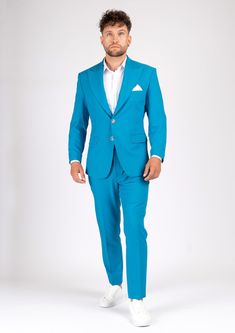 Dress to impress in the Hudson Sapphire Blue Stretch Suit! This suave custom suit is made from a stretch cotton fabric for a look that's both comfortable and vibrant. With its radiant hue, you're sure to turn heads at any event! So suit up - it's time to shine! Fitted Cotton Formal Set, Fitted Cotton Sets For Formal Occasions, Fitted Cotton Suit With Notch Lapel, Fitted Cotton Suits With Notch Lapel, Fitted Cotton Sets With Notch Lapel, Fitted Blue Long Sleeve Suits, Blue Cotton Notch Lapel Suit, Semi-formal Fitted Cotton Sets, Fitted Cotton Set For Semi-formal Occasions