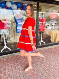 Be the cutest American gal in town with our American Cutie Mini Dress! Featuring white and blue ric rac details and a square neckline, this baby doll dress is perfect for any summer event. Say goodbye to boring outfits and hello to playful vibes with this dress! Key Features: Red with white & blue Ric Rac trim Square neck Puff Sleeves with elastic Mini Dress Pockets 100% Cotton Stylist Review: Model is 5'9" with a 34" bust and a 29" waist and usually wears a medium or large in tops. Model is pic Ric Rac, Summer Events, Pocket Dress, Babydoll Dress, Square Neck, Puff Sleeve, Baby Dolls, Mini Dress, Dresses